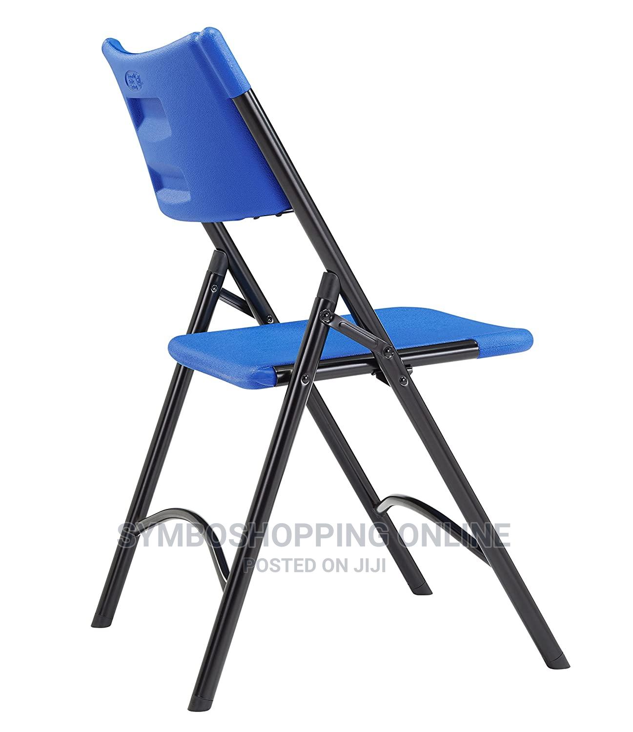 National Public Seating 604 Plastic Folding Chair, Blue in Airport